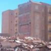 May 21, 2003 Boumerdes earthquake. Modern building completely collapsed in Boumerdes, Algeria. 
Photo Credit: Djillali Benour
