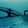 Ben Sawyer Bridge to Sullivans Island after passage of Hurricane Hugo. Late September, 1989

Photographer: National Hurricane Center
