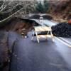 Damage to Oregon State Highway 229 at the head of an earth slide.

USGS Image
