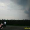 Ryan Orlick of NaturesFury.net filming shelf cloud in Boone County Il. on May 22, 2011

Photo By: Caitlyn Orlick (NaturesFury.net)