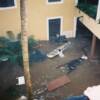 A lady being rescued from a ground floor room of the Triton Hotel, Sri Lanka at 10:17 by hotel staff. Photo By: Chris Chapman, Schlumberger Cambridge Research, Cambridge, U.K