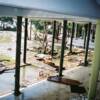 This is a view of the swimming pool at the Triton Hotel, Sri Lanka at 14:56. Apart from debris there is a lot of (heating) oil in the swimming pool. Photo By: Chris Chapman